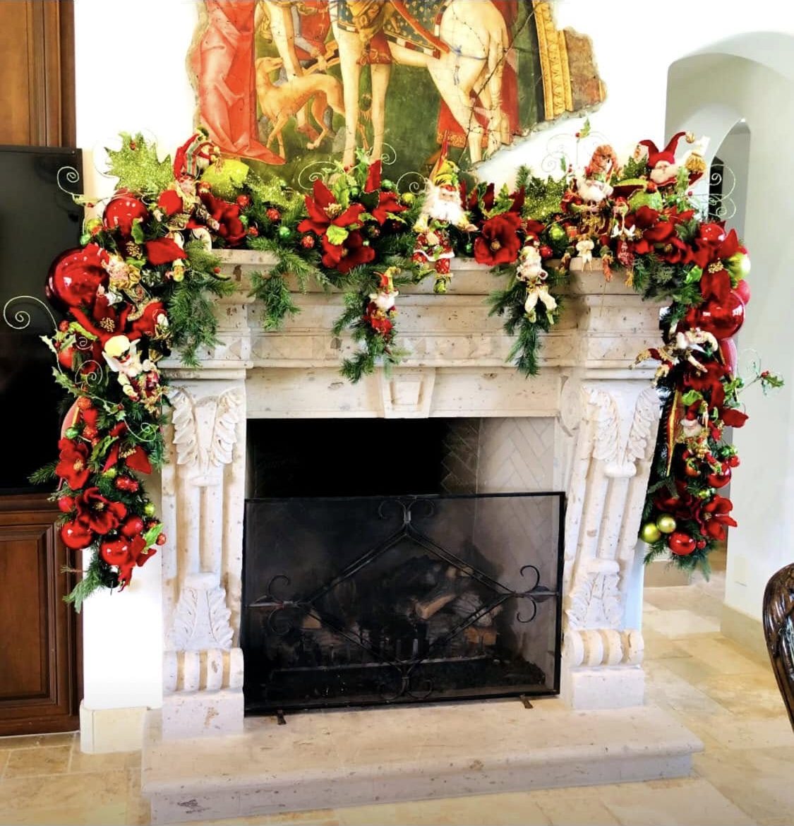 Mantel with poinsettia garland